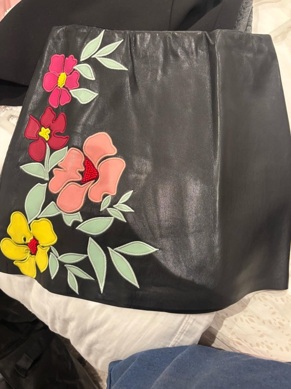 Alice & Olivia Black Faux Leather Skirt with Multicolor Floral Appliqué